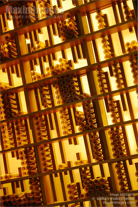 Stock photo of Wall with bottles on shelves Buy commercial use license at MaximImages
