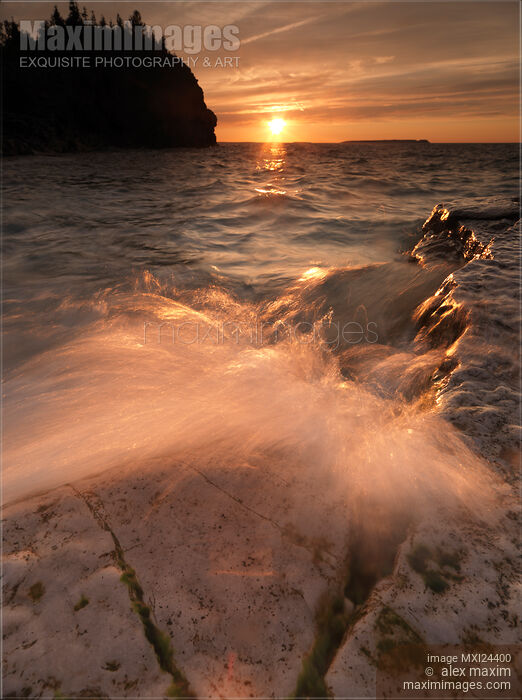 Waves hitting against the rocky shore of Georgian Bay Stock photo of Waves hitting against the rocky shore of Georgian Bay Buy commercial use license at MaximImages