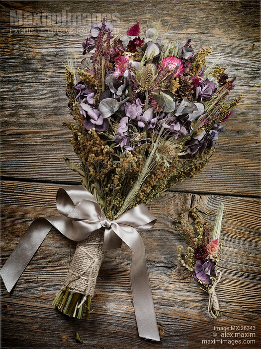 Stock photo of Wedding bouquet and boutonniere made of dried flowers Buy commercial use license at MaximImages