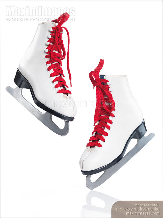 White ice skates with red laces Stock photo of White ice skates with red laces Buy commercial use license at MaximImages