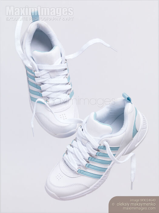 Stock photo of White sports shoes Buy commercial use license at MaximImages