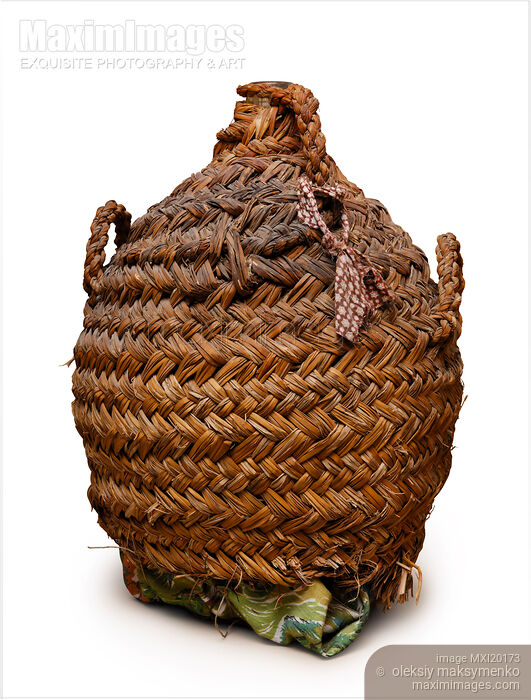 Stock photo of Wicker Wine Bottle Buy commercial use license at MaximImages