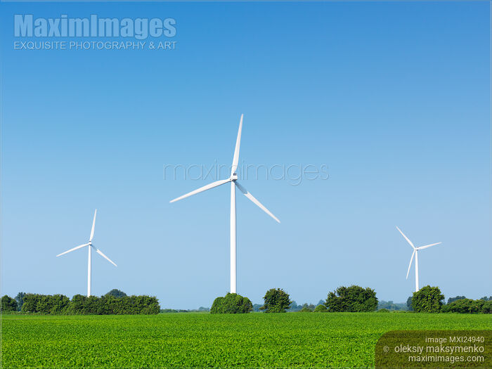 Wind turbines in green field Stock photo of Wind turbines in green field Buy commercial use license at MaximImages