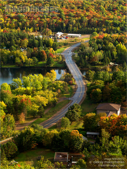 Stock photo of Winding Road Through Fall Nature Buy commercial use license at MaximImages
