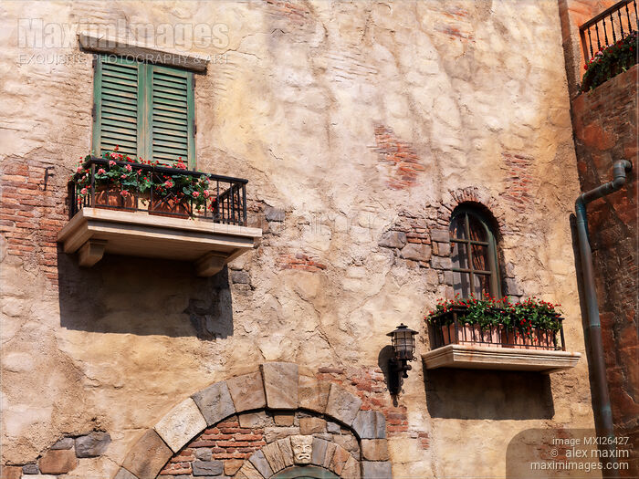 Stock photo of Windows of an old rustic house Buy commercial use license at MaximImages