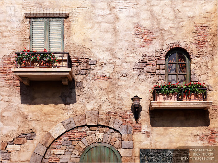 Windows with flowers of old rustic house Stock photo of Windows with flowers of old rustic house Buy commercial use license at MaximImages