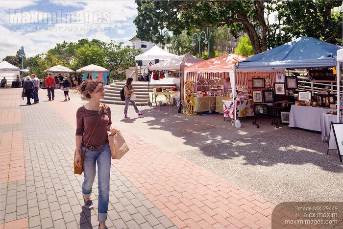 Stock photo of Woman at city of Nanaimo downtown farmer's market Vancouver Island Buy commercial use license at MaximImages
