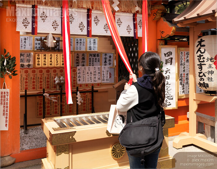 Woman at Jishu Jinja matchmaking shrine of Kiyomizu-dera in Kyoto Stock photo of Woman at Jishu Jinja matchmaking shrine of Kiyomizu-dera in Kyoto Buy commercial use license at MaximImages