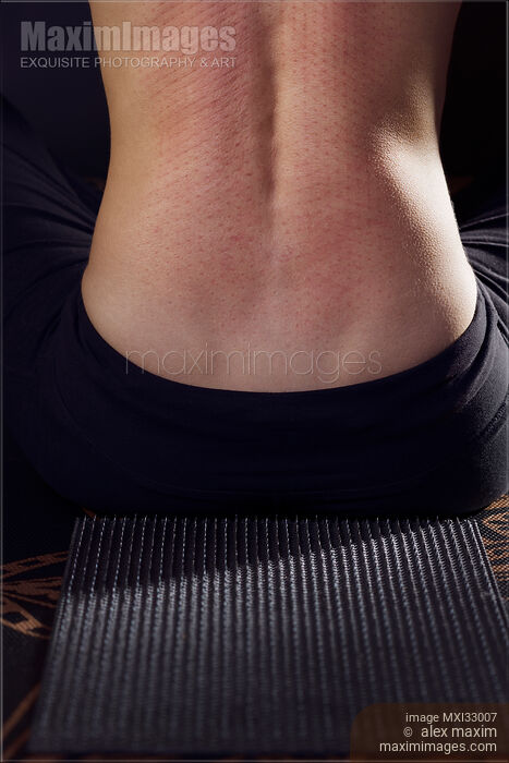 Stock photo of Woman back with nail prints from acupressure needle mat Buy commercial use license at MaximImages