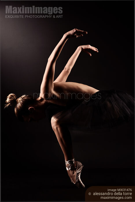 Stock photo of Woman dancer in a black tutu artistic nudes Buy commercial use license at MaximImages