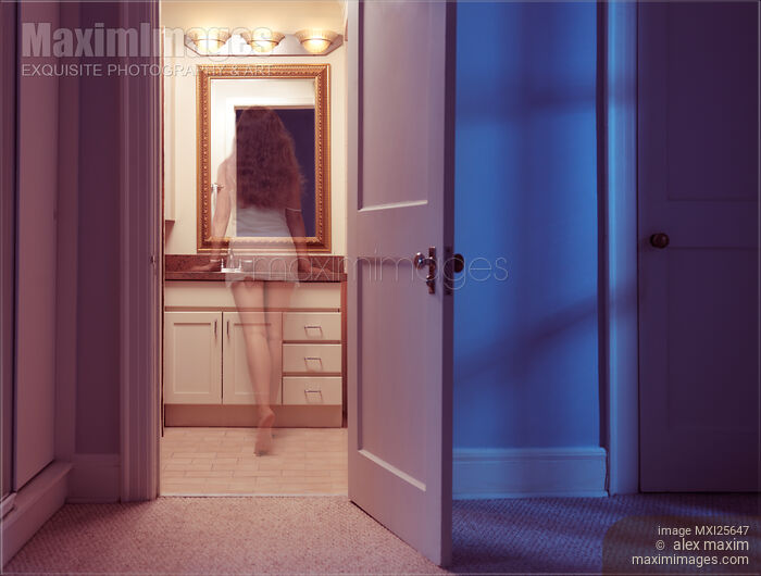 Woman ghost at a bathroom mirror Stock photo of Woman ghost at a bathroom mirror Buy commercial use license at MaximImages