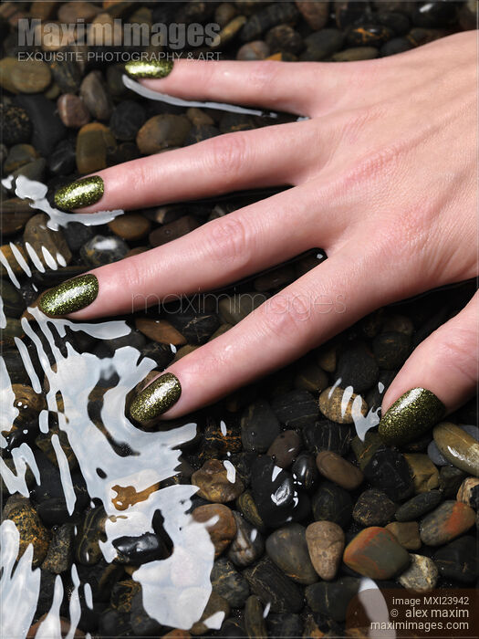 Woman Hand in Water Stock photo of Woman Hand in Water Buy commercial use license at MaximImages