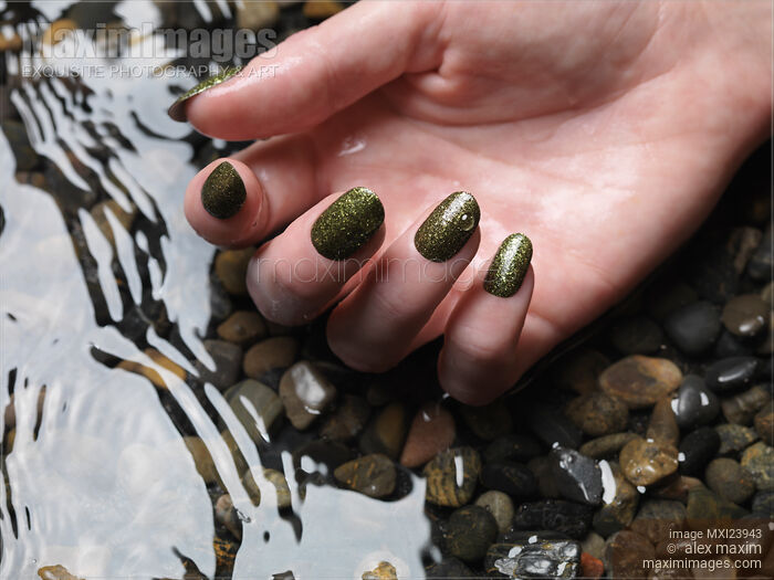 Woman Hand in Water Stock photo of Woman Hand in Water Buy commercial use license at MaximImages