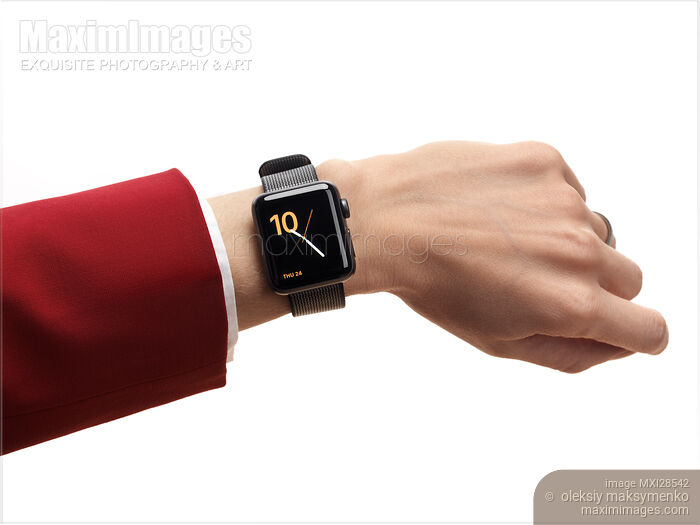 Woman hand with Apple Watch Stock photo of Woman hand with Apple Watch Buy commercial use license at MaximImages