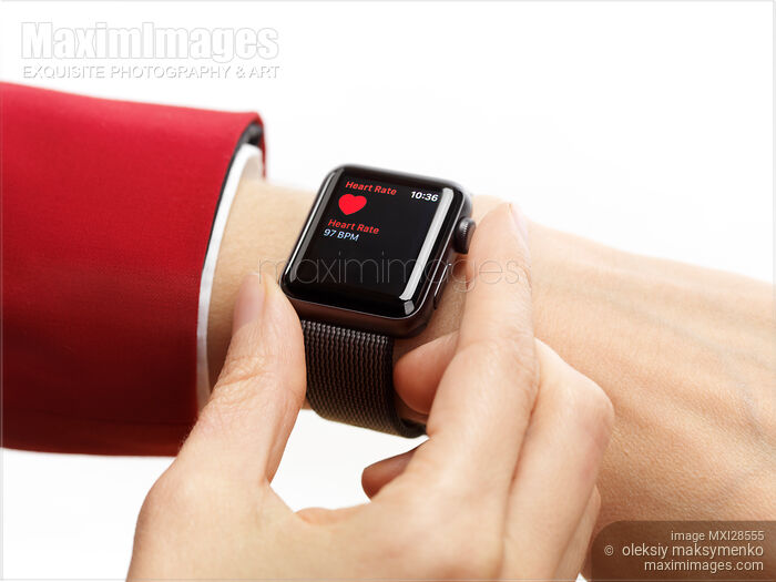 Woman hand with Apple Watch measuring heart rate Stock photo of Woman hand with Apple Watch measuring heart rate Buy commercial use license at MaximImages