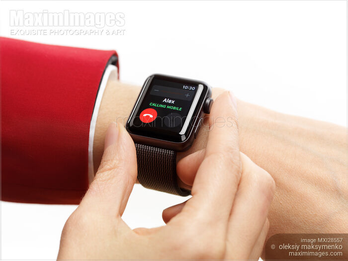 Woman hand with Apple Watch receiving a call Stock photo of Woman hand with Apple Watch receiving a call Buy commercial use license at MaximImages