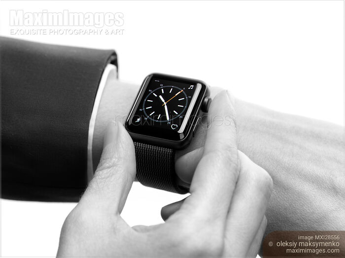 Woman hand with Apple Watch showing time Stock photo of Woman hand with Apple Watch showing time Buy commercial use license at MaximImages