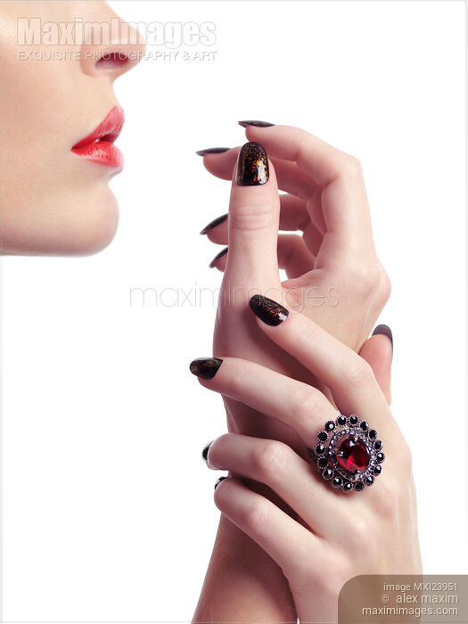 Stock photo of Woman Hands and Lips Buy commercial use license at MaximImages