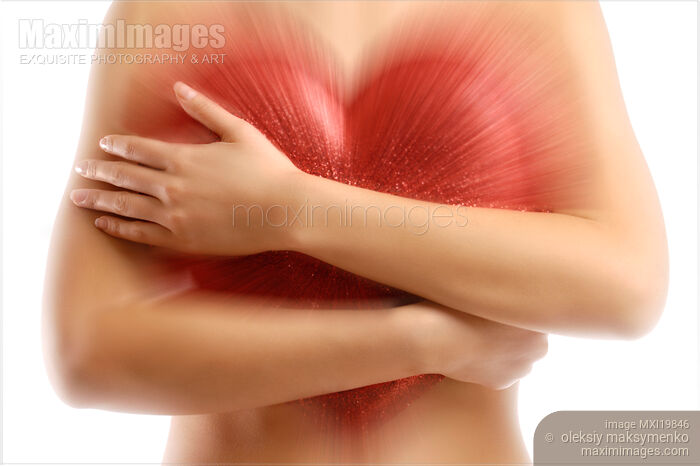 Woman holding red heart Stock photo of Woman holding red heart Buy commercial use license at MaximImages