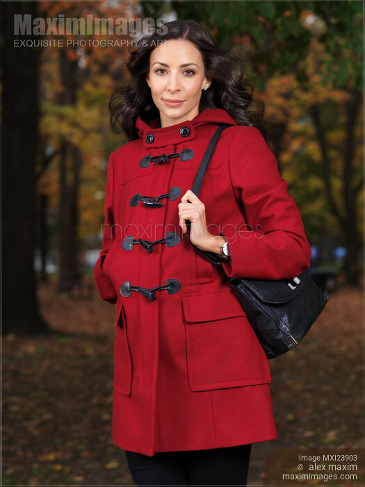 Woman in a Red Coat in Fall Stock photo of Woman in a Red Coat in Fall Buy commercial use license at MaximImages