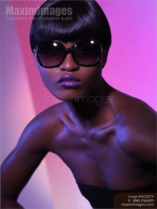 Stock photo of Woman in Black Sunglasses Buy commercial use license at MaximImages