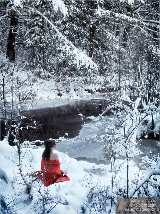 Woman in red kimono sitting in snow by a river Stock photo of Woman in red kimono sitting in snow by a river Buy commercial use license at MaximImages