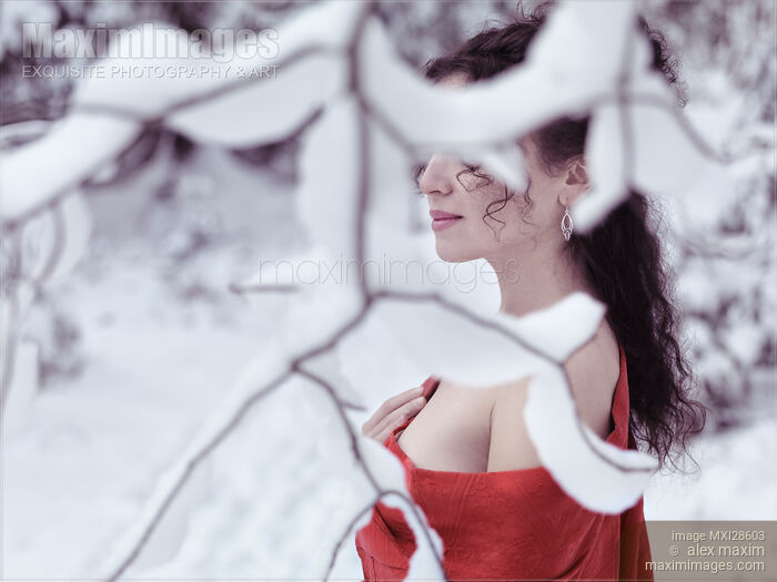 Stock photo of Woman in red kimono with bare shoulders in winter snow Buy commercial use license at MaximImages