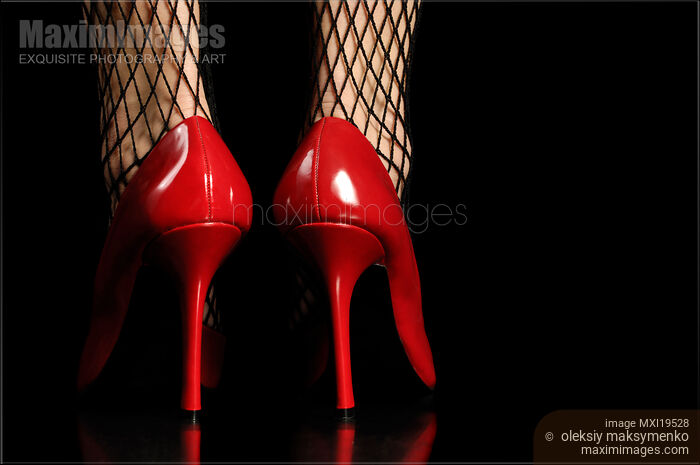 Stock photo of Woman in red sexy high heels Buy commercial use license at MaximImages