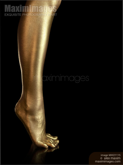 Woman Legs Painted with gold Stock photo of Woman Legs Painted with gold Buy commercial use license at MaximImages