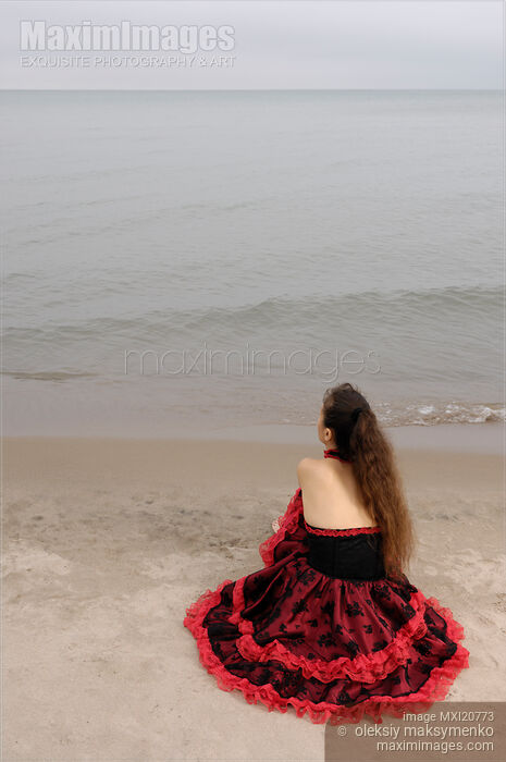 Stock photo of Woman on a Shore Buy commercial use license at MaximImages