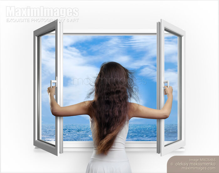 Woman opening window with view on sea Stock photo of Woman opening window with view on sea Buy commercial use license at MaximImages