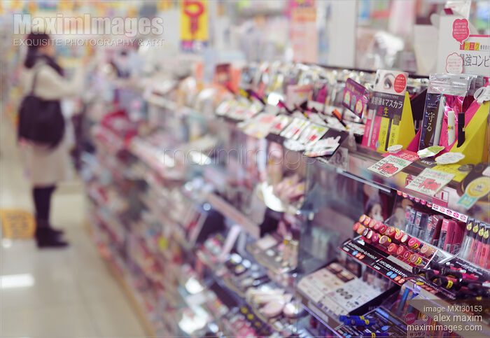 Woman shopping at makeup and cosmetics section of beauty store in Japan Stock photo of Woman shopping at makeup and cosmetics section of beauty store in Japan Buy commercial use license at MaximImages