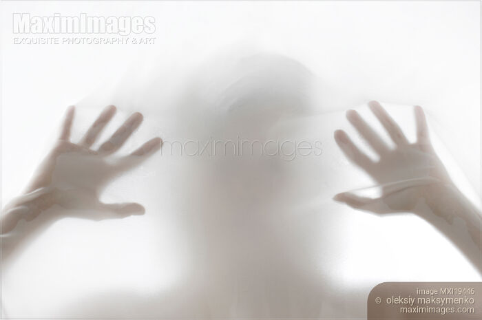 Woman Silhouette Behind White Haze Stock photo of Woman Silhouette Behind White Haze Buy commercial use license at MaximImages