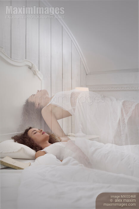 Woman sleeping in bed while her ethereal body rising above Lucid dreaming concept Stock photo of Woman sleeping in bed while her ethereal body rising above Lucid dreaming concept Buy commercial use license at MaximImages