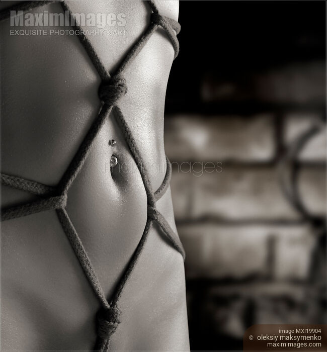 Stock photo of Woman Stomach with Artistic Rope Bondage Shibari Buy commercial use license at MaximImages