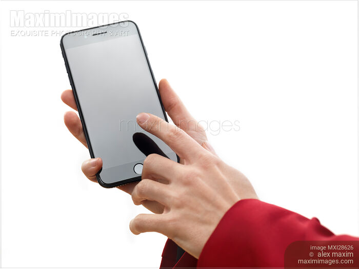 Stock photo of Woman touching screen of Apple iPhone 7 Plus Buy commercial use license at MaximImages
