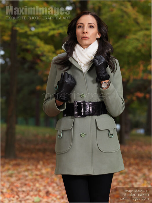 Woman Wearing a Green Coat Stock photo of Woman Wearing a Green Coat Buy commercial use license at MaximImages