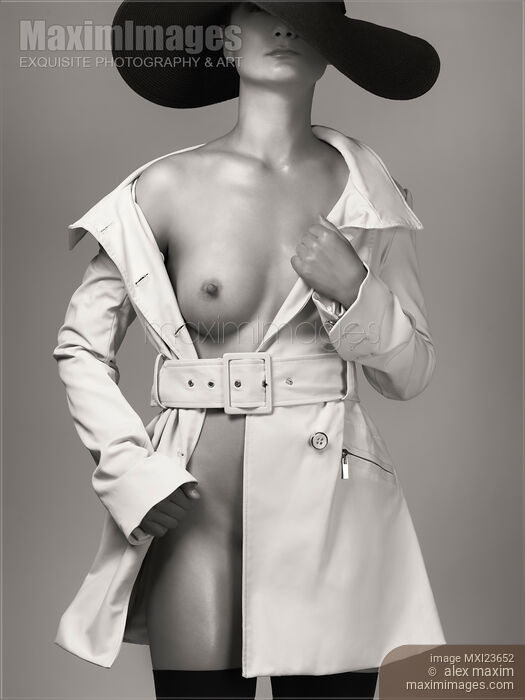 Woman Wearing Trench Coat over Naked Body Stock photo of Woman Wearing Trench Coat over Naked Body Buy commercial use license at MaximImages