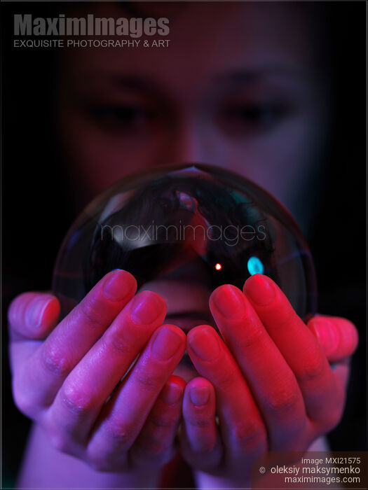 Stock photo of Woman with a Crystal Ball Buy commercial use license at MaximImages