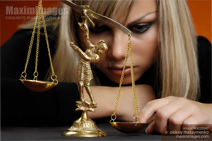 Woman with Justice Scales Law Concept Stock photo of Woman with Justice Scales Law Concept Buy commercial use license at MaximImages