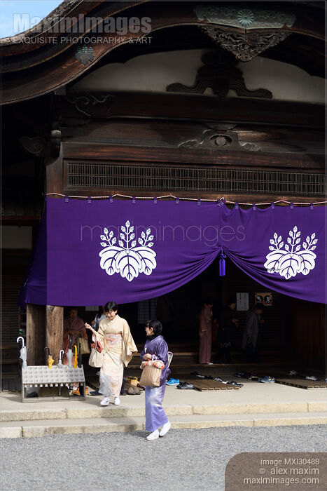 Stock photo of Women exiting Sanbo-in Sanboin Buddhist temple a sub-temple of Daigo-ji Daigoji complex in Kyoto Buy commercial use license at MaximImages