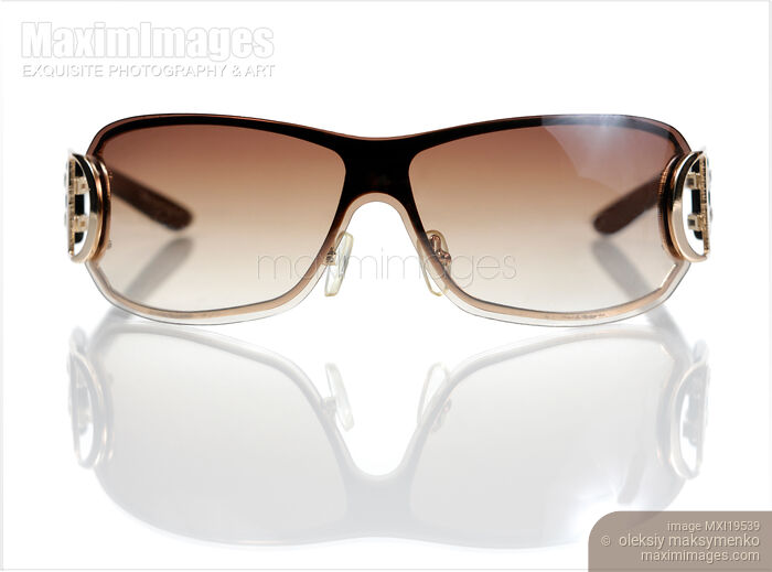 Stock photo of Women Sunshades Buy commercial use license at MaximImages