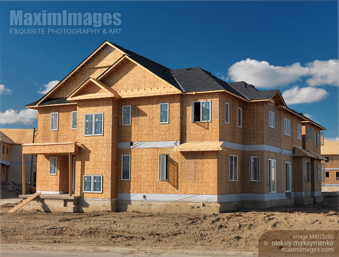Wooden-Fame House Under Construction Stock photo of Wooden-Fame House Under Construction Buy commercial use license at MaximImages