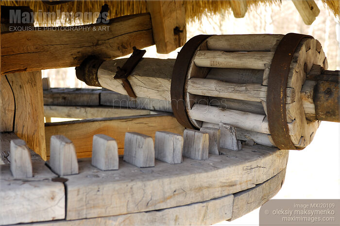 Stock photo of Wooden gears of old water pump Buy commercial use license at MaximImages