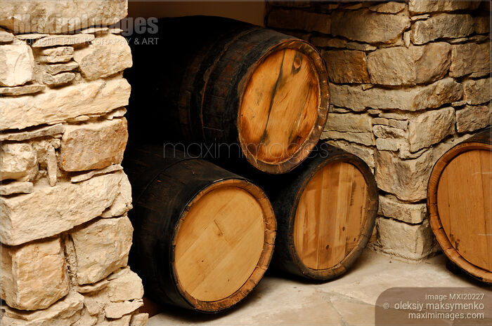 Wooden Wine Barrels in Cellar Stock photo of Wooden Wine Barrels in Cellar Buy commercial use license at MaximImages