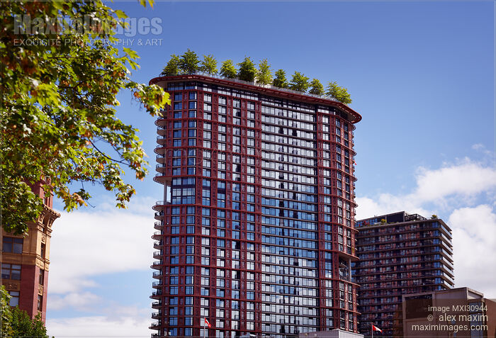 Stock photo of Woodward's Building with trees on the roof in downtown of Vancouver Buy commercial use license at MaximImages
