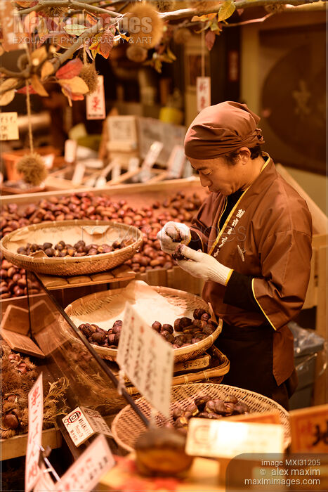 Stock photo of Yakikuri roasted chestnuts Japanese food vendor at Nishiki food market Buy commercial use license at MaximImages