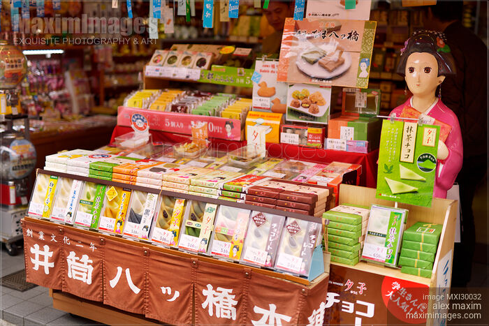 Yatsuhashi triangles with red bean paste Miyagegashi souvenir sweets on store display in Kyoto Stock photo of Yatsuhashi triangles with red bean paste Miyagegashi souvenir sweets on store display in Kyoto Buy commercial use license at MaximImages