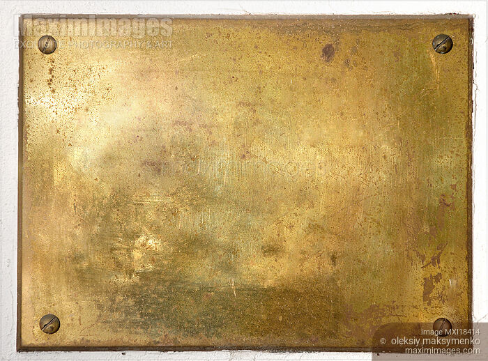 Stock photo of Yellow brass metal sign Buy commercial use license at MaximImages