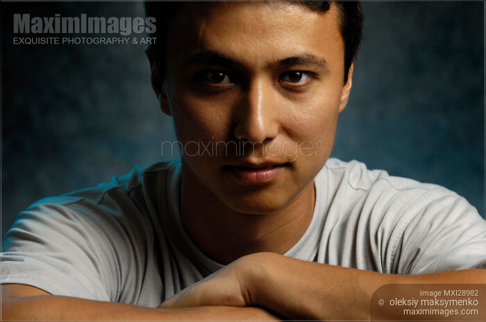 Stock photo of Young Asian Man Buy commercial use license at MaximImages
